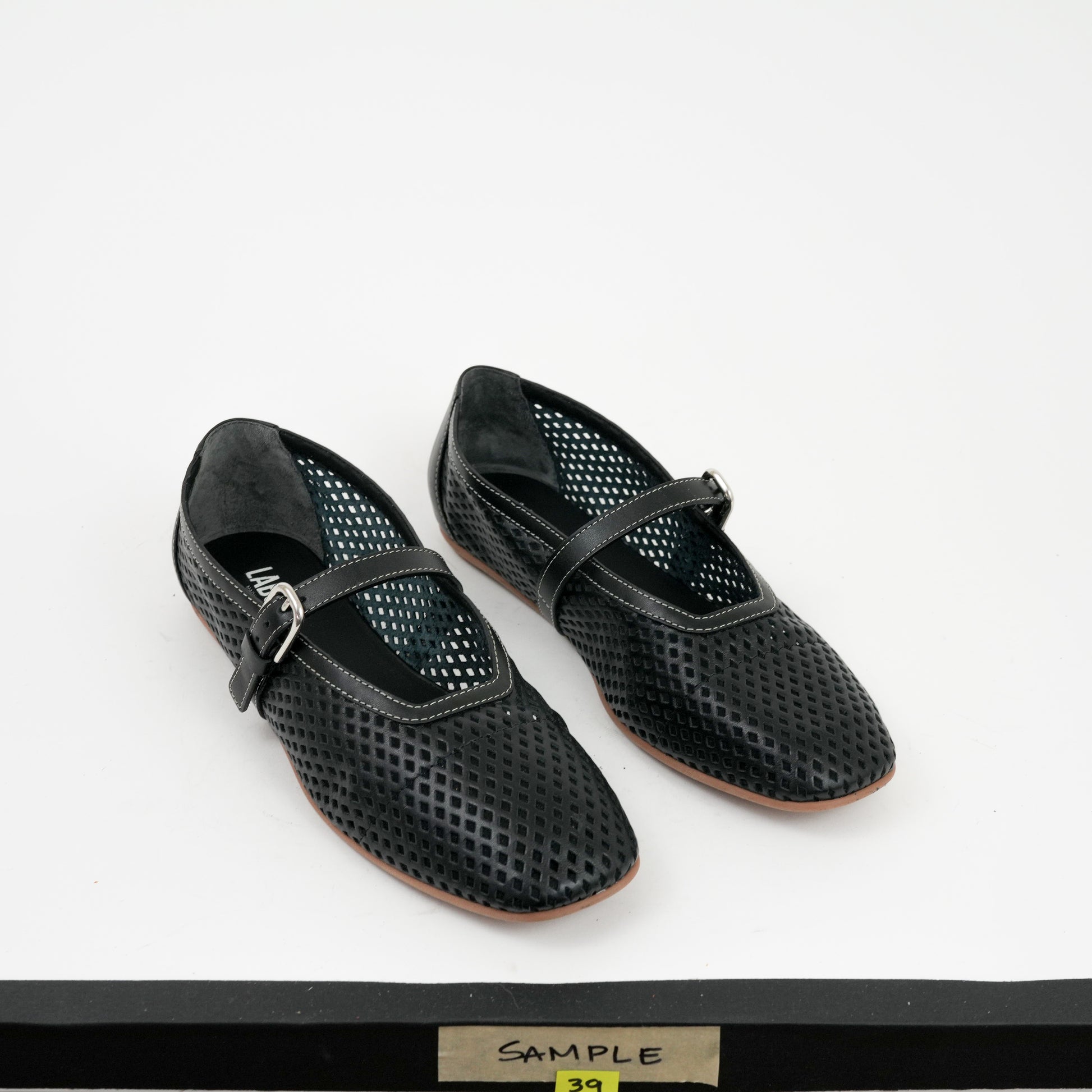 Tactile Perforated Lido Flat Black Unlined Sample 39