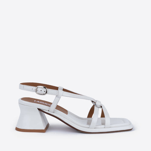 Athena Ivory women's sandals with chunky heel, synthetic leather and rubber, featuring a buckle, on a white background.