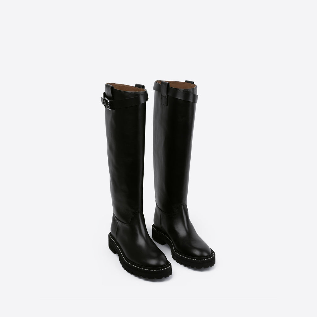 Pair of black knee-high boots on a white background