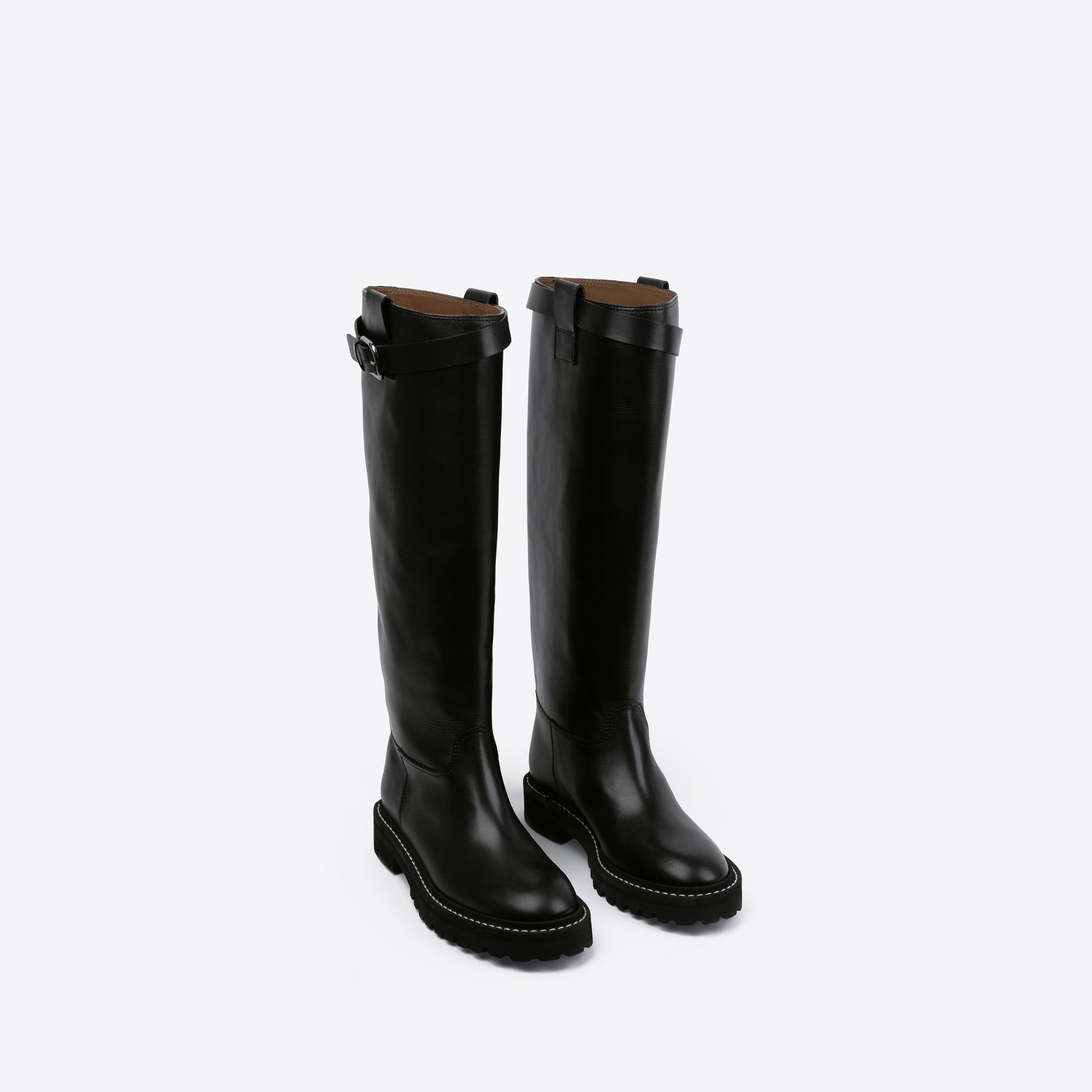 Pair of black knee-high boots on a white background