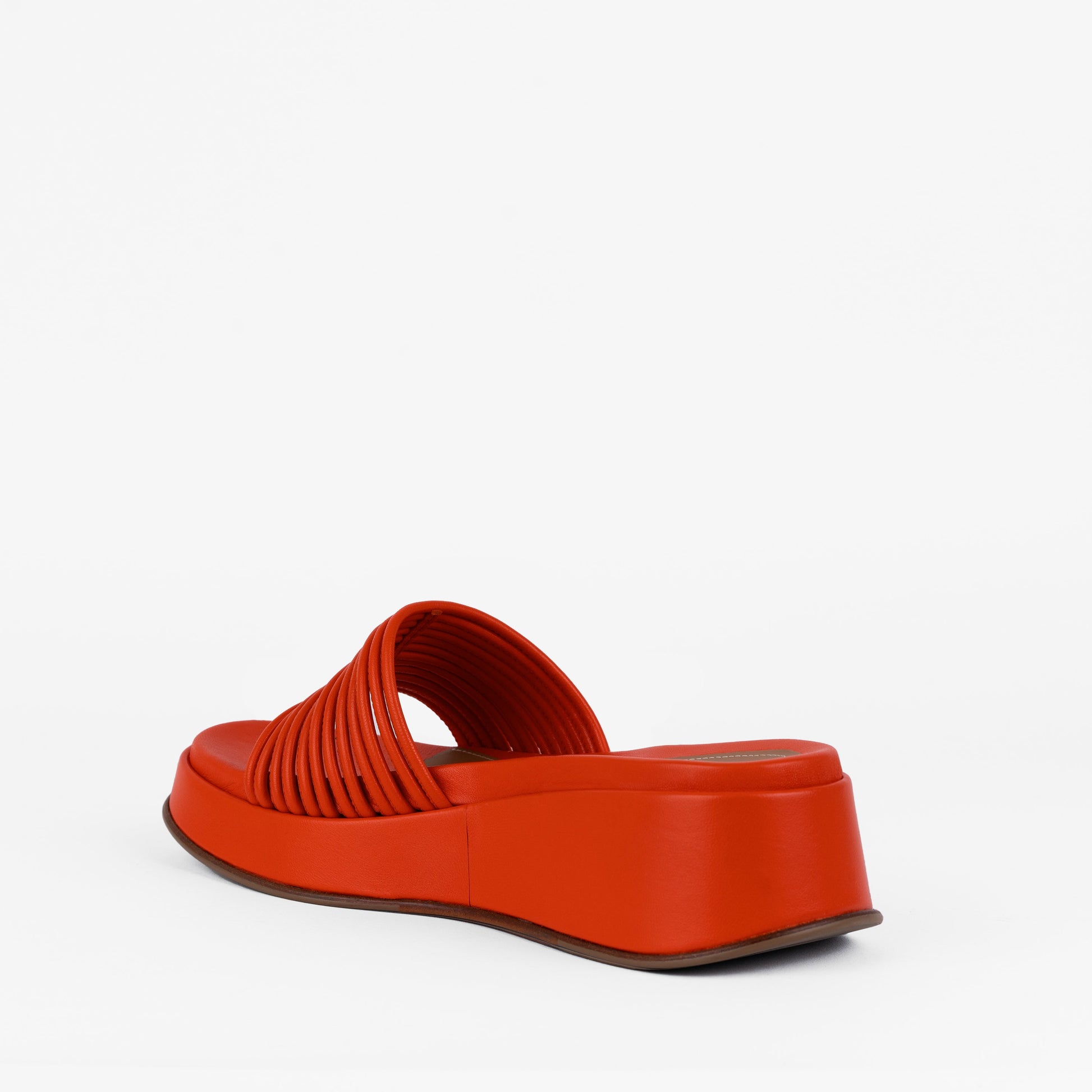 Caye Slide Tangerine in tan product displayed against clean background