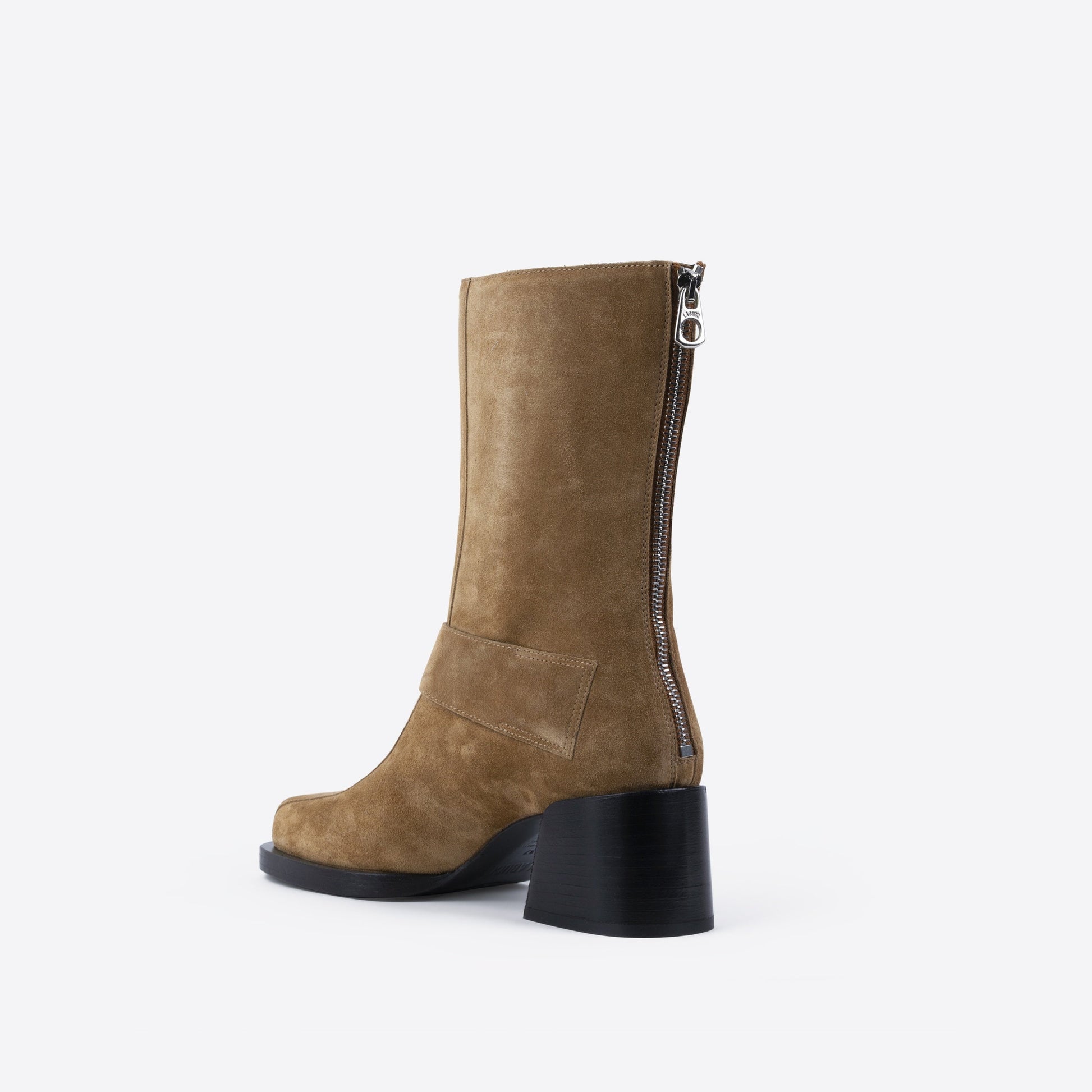 Brown suede boot with a black block heel on a white background