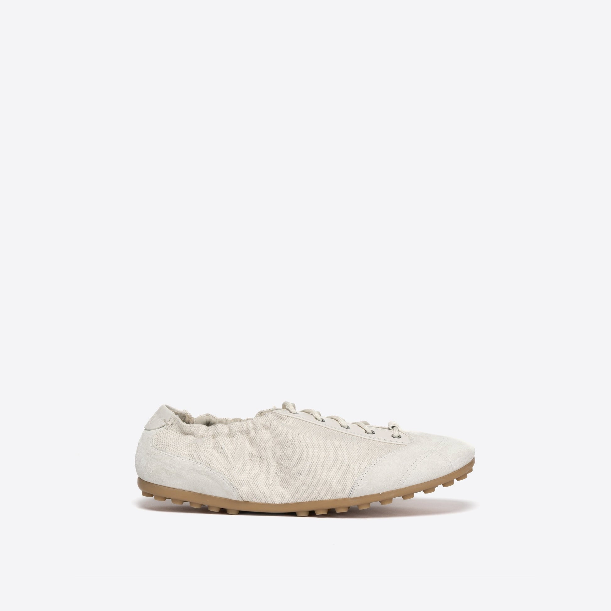 White flat shoe on a white background