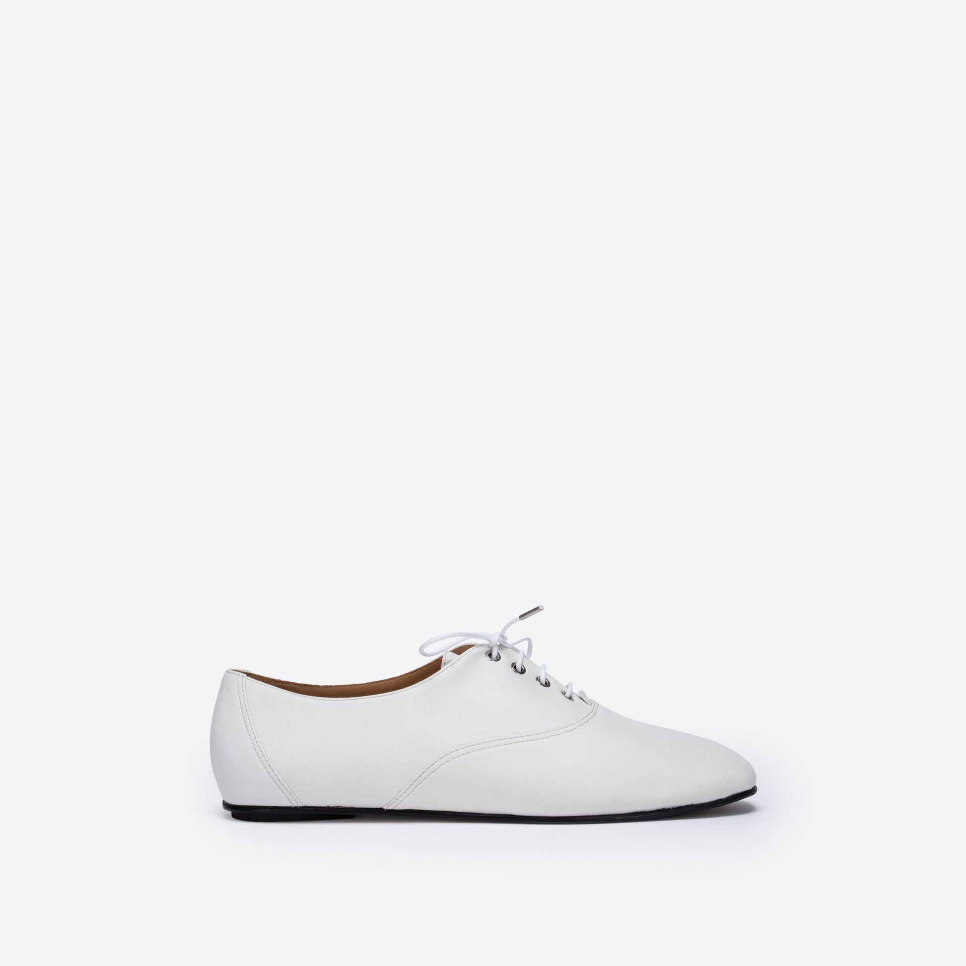 White leather shoe on a white background